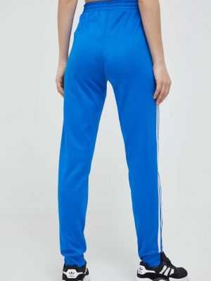 Sportovní kalhoty s aplikacemi Adidas Originals modré