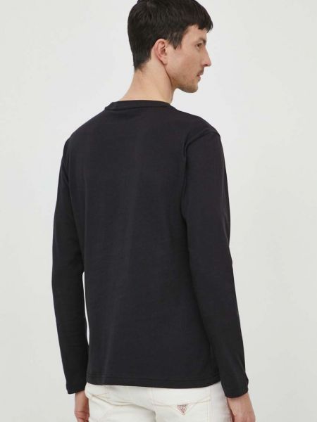 Bavlněné tričko s dlouhým rukávem s potiskem s dlouhými rukávy Calvin Klein černé