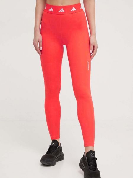 Spodnie sportowe z nadrukiem Adidas Performance czerwone