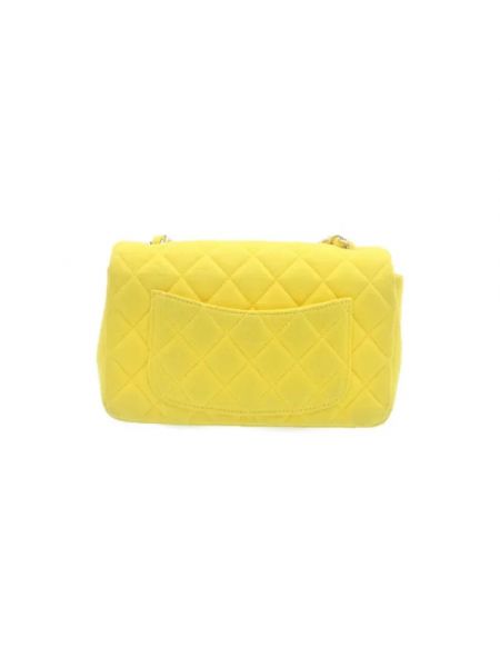 Bolso cruzado Chanel Vintage amarillo