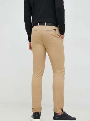 Přiléhavé kalhoty Calvin Klein béžové