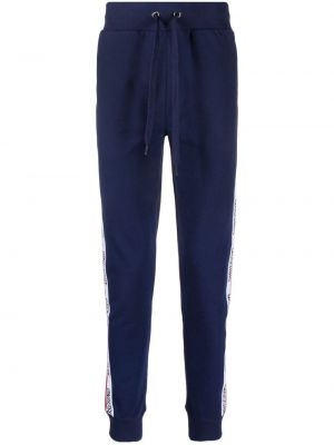 Bavlnené teplákové nohavice Moschino modrá