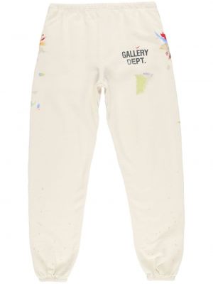 Spodnie sportowe z nadrukiem Gallery Dept. białe