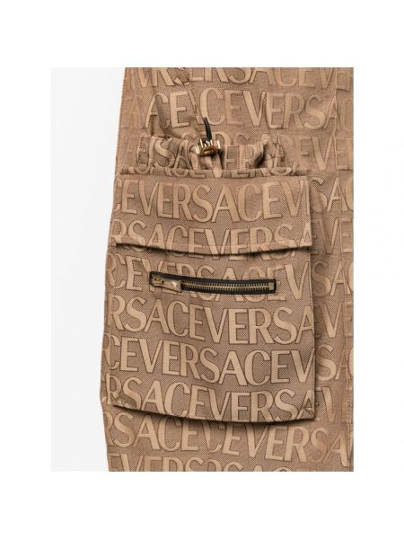Spodnie Versace brązowe