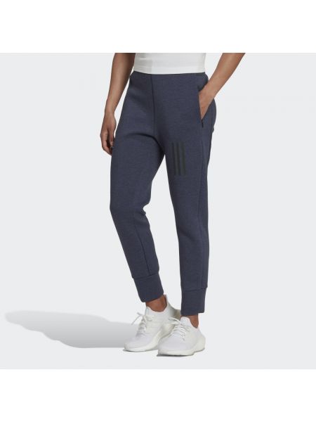 Spodnie slim fit Adidas niebieskie