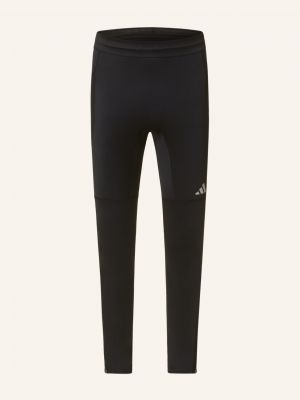 Běžecké kalhoty se síťovinou Adidas černé