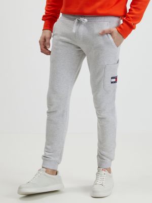 Sportovní kalhoty Tommy Jeans šedé