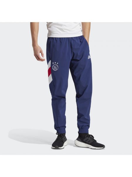 Spodnie sportowe plecione Adidas niebieskie