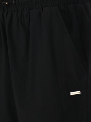 Priliehavé teplákové nohavice Athlecia čierna