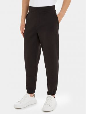 Priliehavé teplákové nohavice Calvin Klein čierna