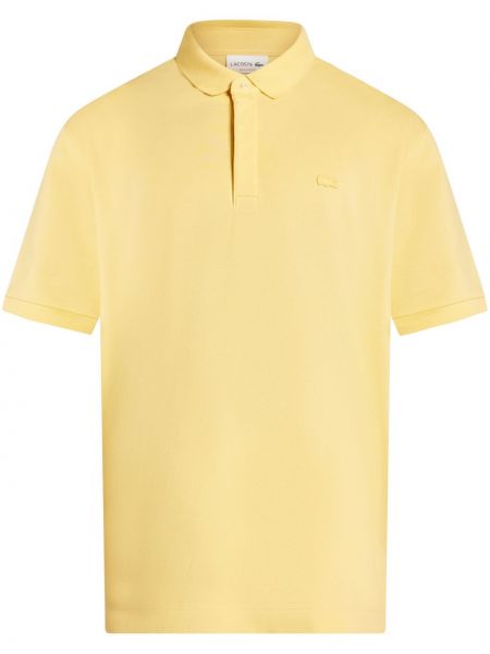 Памучна поло тениска Lacoste жълто