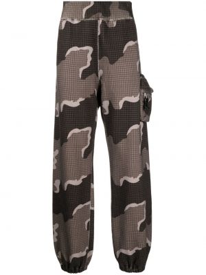 Pantaloni con stampa camouflage Undercover marrone