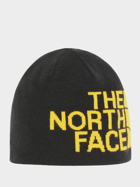 Двусторонняя шапка The North Face желтая