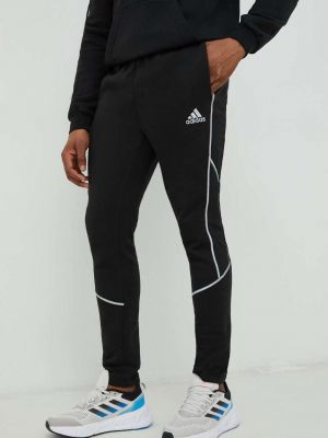 Sportovní kalhoty s aplikacemi Adidas černé