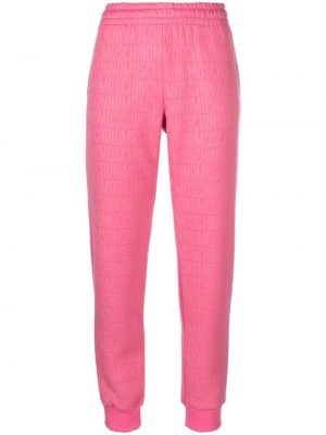 Růžové sportovní kalhoty s potiskem Moschino