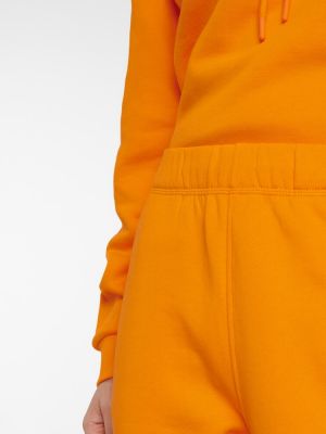 Bavlněné sportovní kalhoty Ganni oranžové