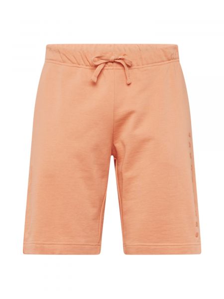 Teplákové nohavice Jack & Jones oranžová