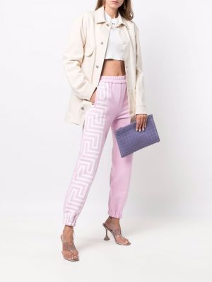 Kalhoty s potiskem Versace růžové