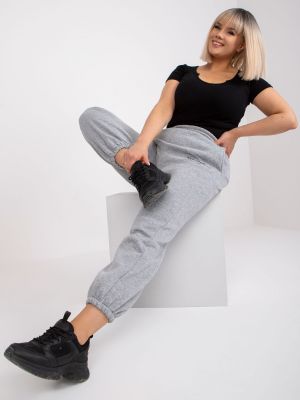 Teplákové nohavice so slieňovým vzorom s vreckami Fashionhunters sivá