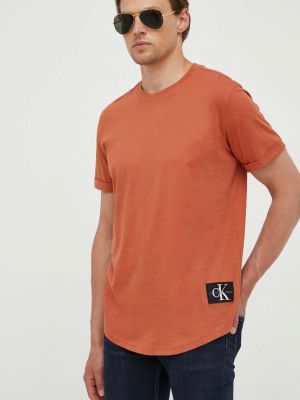 Тениска с дълъг ръкав с апликация Calvin Klein Jeans кафяво