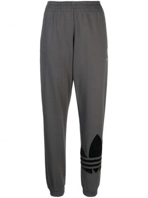 Pantalon de joggings en suède en coton à imprimé Adidas gris