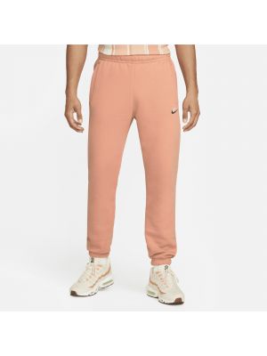 Spodnie polarowe Nike pomarańczowe