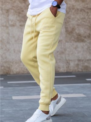Spodnie sportowe slim fit Madmext żółte
