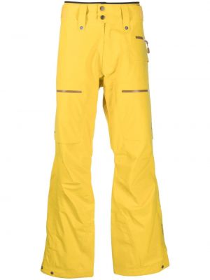Spodnie relaxed fit Norrona żółte