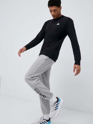 Spodnie sportowe z nadrukiem Adidas szare