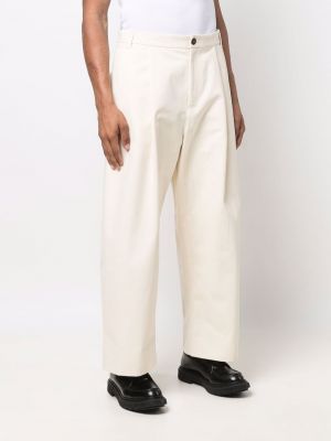 Spodnie relaxed fit plisowane Studio Nicholson białe
