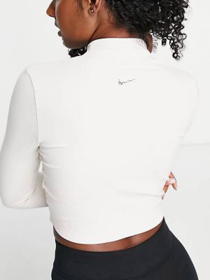 Белоснежный укороченный топ с длинными рукавами Nike Yoga Luxe Dri-FIT