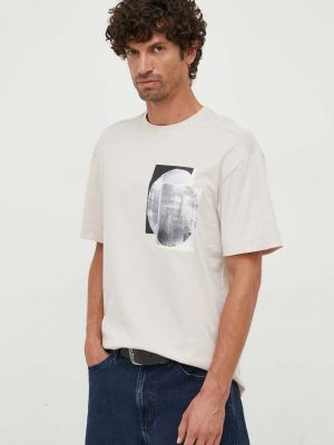 Bavlněné tričko s potiskem Calvin Klein béžové