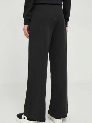 Jednobarevné sportovní kalhoty s vysokým pasem Calvin Klein Jeans černé