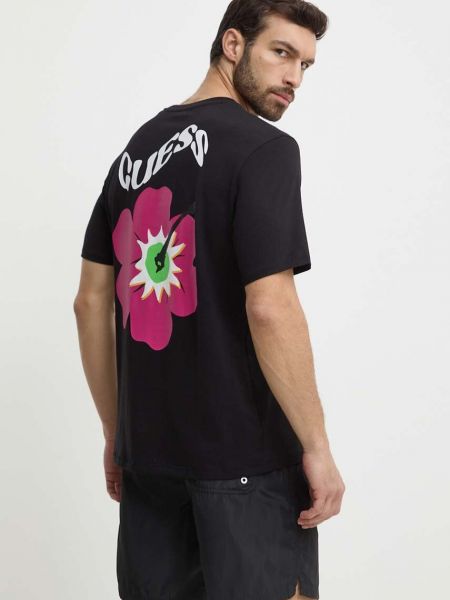 Koszulka bawełniana w kwiatki z nadrukiem Guess czarna