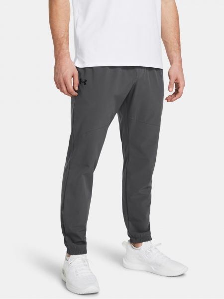 Pletené sportovní kalhoty Under Armour šedé