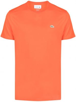 Bombažna majica z vezenjem Lacoste oranžna