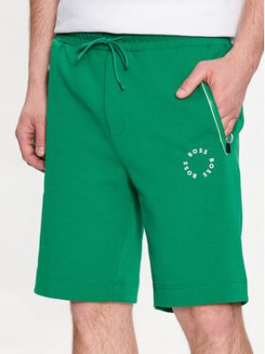 Priliehavé teplákové nohavice Boss zelená