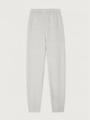 Priliehavé teplákové nohavice American Vintage sivá