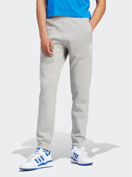Slim fit priliehavé teplákové nohavice Adidas sivá