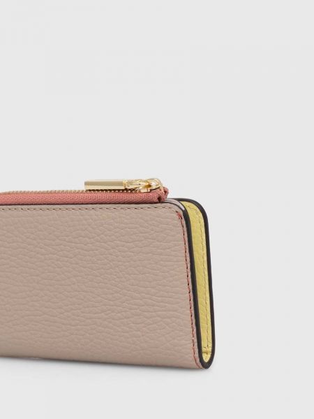 Рожевий шкіряний гаманець Coccinelle