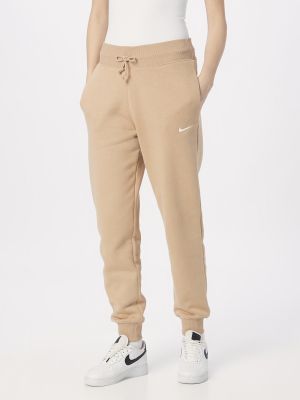 Teplákové nohavice Nike Sportswear biela