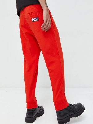 Bavlněné sportovní kalhoty Superdry červené