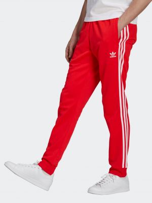 Teplákové nohavice Adidas - Červená