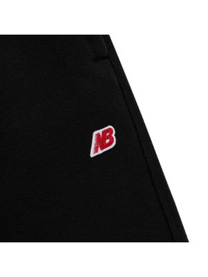 Pantalon de sport en polaire en coton New Balance noir