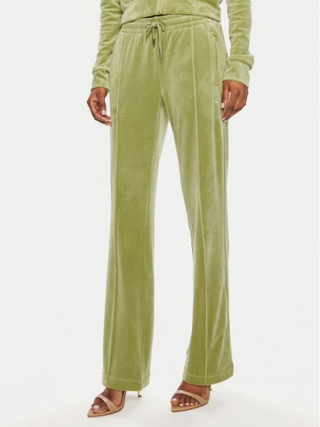 Priliehavé teplákové nohavice Juicy Couture zelená