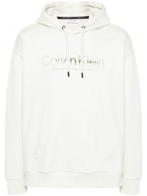 Pamučna hoodie s kapuljačom s printom Calvin Klein zelena