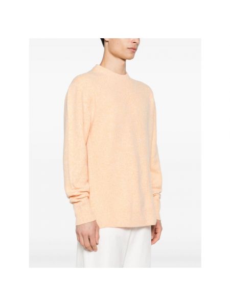 Sweter wełniany w kolorze melanż Jil Sander pomarańczowy