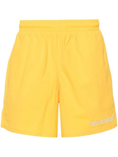 Shortsit New Balance keltainen