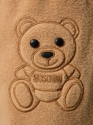Bavlnené teplákové nohavice Moschino béžová