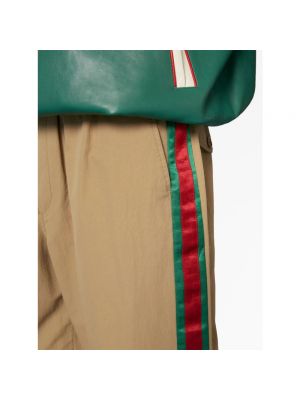 Spodnie sportowe w paski Gucci zielone